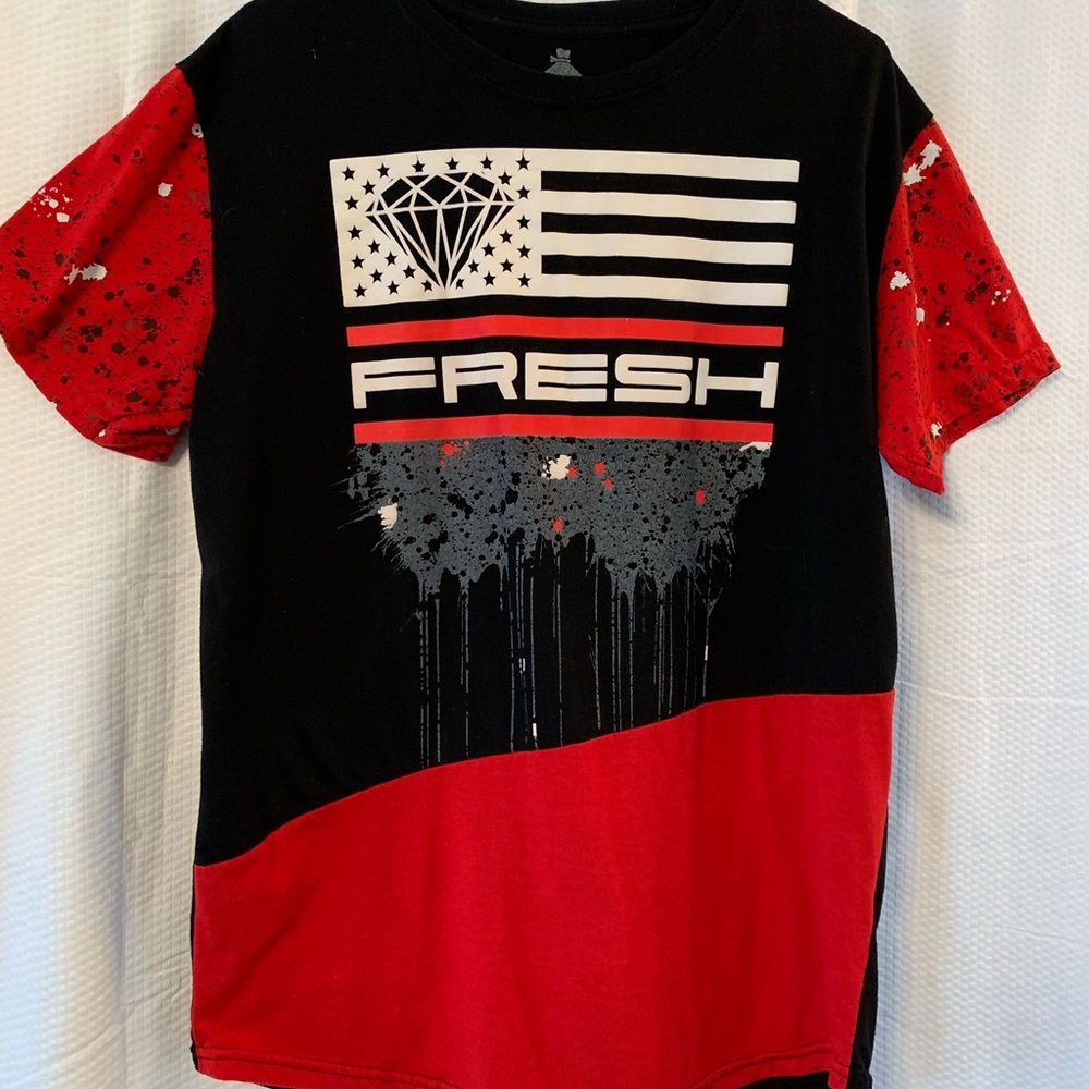 Sold.  L. Men’s design t- shirt